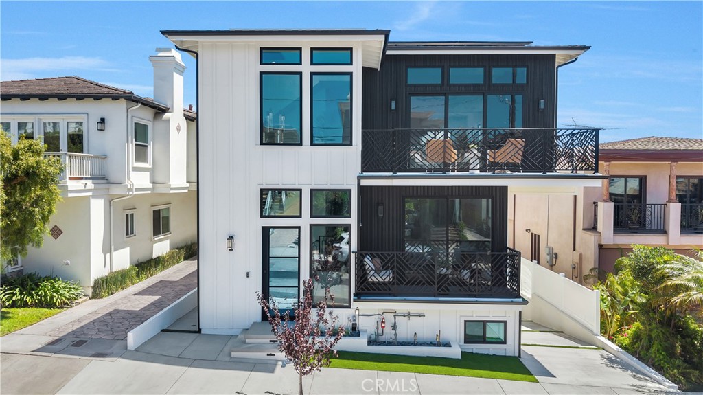 Nestled on one of the most coveted blocks west of Prospect, this exceptional three-storey residence offers a harmonious blend of modern luxury and coastal charm. Perched above the Pacific, it invites you to bask in sweeping water views and the gentle sea breeze.
Ascend to the private rooftop deck, where the horizon unfolds in a tapestry of ocean and sky. Whether savouring a tranquil sunset or hosting intimate gatherings, this elevated perch offers a serene escape above the city’s rhythm.
The gourmet kitchen stands as the heart of the home, featuring a grand island, six-burner stove, and Energy Star-qualified appliances. Quartz countertops grace both kitchen and bathrooms, marrying elegance with practicality. A spacious walk-in pantry ensures that every culinary need is met with ease.
An airy, open floor plan seamlessly connects the living, dining, and kitchen areas, fostering a sense of flow and togetherness. Natural light pours through expansive windows, illuminating the space and highlighting the home's thoughtful design.
A thoughtfully designed laundry room enhances daily convenience, completing the home’s commitment to comfort and style.
Combining comfort, style, and energy efficiency, this home is perfect for those seeking a truly exceptional living experience in one of Southern California's most desirable locales.