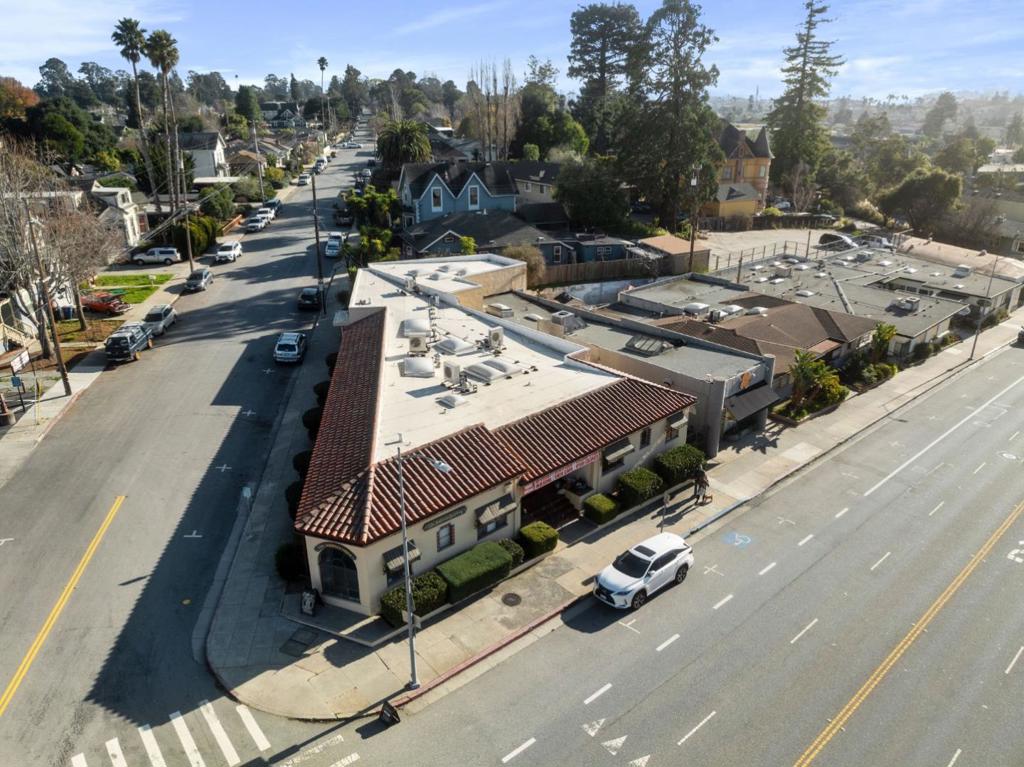 The Sullivan Building Complex at 526-540 Soquel Ave & 545 Ocean View Ave is a collection of mid-century Medical, Personal Care and Professional Suites in 4 buildings spread out across three parcels on a prime corner convenient to The Buttery, Shoppers Corner and the other popular boutique shops and restaurants of Mid-Town. The longtime owners have taken great pride in the property with updates and renovations made to many of the interior and exterior components of the buildings through the years, with over $420,000 in capital improvements added since 2020, including courtyard remodel for the Medical Arts Building, plus new windows, new plumbing, new flooring, new heat and new air for many of the suites in the complex. Located in an Opportunity Zone, with access to public transit, the assemblage is eligible for multi-story mixed-use development of high-density residential over street-level retail podium. This is an excellent opportunity for an investor seeking to maximize cap rate with upside potential in rents on some of the larger suites which are currently leased month-to-month, or for a developer with the benefit of existing carrier income during entitlement.
