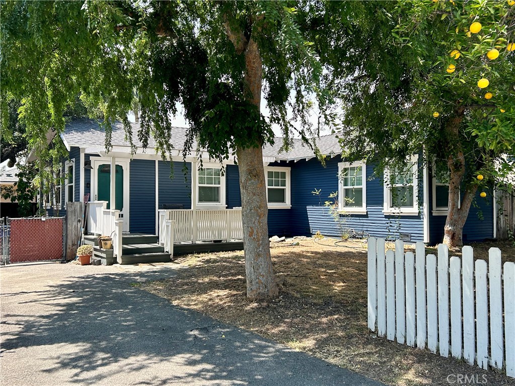 Tucked behind a classic white picket fence in North Monrovia, this charming bungalow feels like a page from a storybook. The shady front yard, accented with mature lemon trees, leads to a welcoming front porch - perfect for morning coffee or evening chats.
Inside, a light-filled living and dining area flows effortlessly into the cozy kitchen. Sunlight streams through energy-efficient windows, highlighting the gleaming hardwood floors and filling both bedrooms with a bright, airy feel. Modern upgrades include a new roof, upgraded electrical, a new central AC system, updated plumbing, earthquake retrofitting, EV Charger and the added benefit of fully paid-off solar panels for energy savings.
In the back, the private yard invites you to unwind in the jacuzzi beneath the stars or enjoy sunny afternoons with friends. A detached garage with laundry area adds convenience, making this home as practical as it is inviting.
This is more than just a house - it’s a place where comfort, character, and modern living come together beautifully. Situated in North Monrovia, just minutes from the historic downtown district with its charming shops, inviting restaurants, and small-town ambiance, yet offering easy access to the 210 Freeway and Downtown LA.