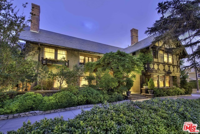 The O'Melveny house. Originally built in 1908 by famed architects Hunt, Eager & Burns. Magnificent grounds encompass approximately ¾ acre and include sprawling lawns, meditation pond, outdoor fireplace area, and a stunning pool and spa. The exquisite English Craftsman estate has been meticulously and authentically restored. Modern conveniences have been carefully and seamlessly incorporated into the home, including a spacious kitchen with butler's pantry, and gracious his/her closets in the master suite - a rare treat in historical homes. Grand formal living and entertaining areas open out to an expansive covered patio that can be an outdoor living room of its own. Exquisite authentic details continue throughout the study, library, and formal dining room. An absolute treasure with an incredible combination of land, history and architecture in Prime Windsor Square.