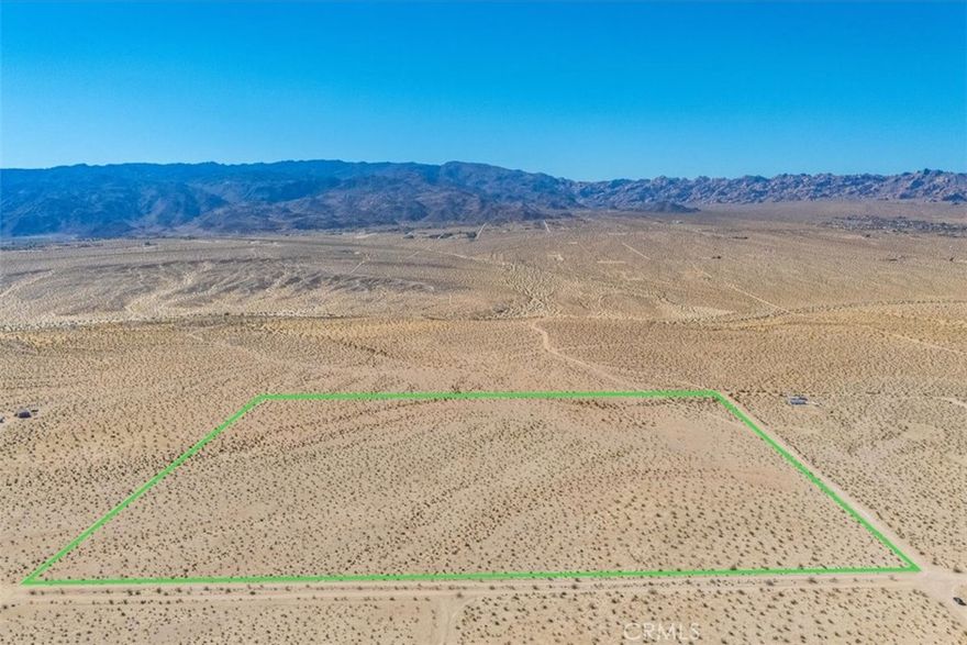 PRICE IMPROVEMENT! Discover your own desert haven on this expansive 38.79-acre parcel in the Desert Heights area of Twentynine Palms. With absolutely panoramic mountain views, this property offers a serene backdrop for those seeking a private retreat or development opportunity. The paid water meter is already in place, adding to the convenience, though the buyer should verify the availability of power. Located just a short drive from Joshua Tree National Park, local hiking trails, and the artistic community of Twentynine Palms, this property is perfect for anyone looking to embrace the wide-open beauty of the high desert.
