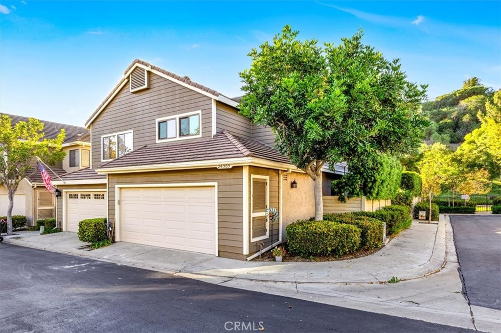 Live Minutes from the Beach in this Turn-Key Laguna Niguel Home Welcome to your dream home in the highly sought-after Camden Court community of Laguna Niguel! This beautifully upgraded attached single-family home offers the perfect blend of style, comfort, and coastal living. Step inside to find soaring vaulted ceilings, sleek luxury vinyl flooring, recessed lighting, and a charming brick fireplace—ideal for cozy evenings. The open-concept layout flows effortlessly from the spacious living room to the dining area and upgraded kitchen, complete with quartz countertops, stainless steel appliances, a huge walk-in pantry, breakfast bar, and direct access to the 2-car garage featuring new epoxy flooring and built-in storage. Upstairs, you'll find three generously sized bedrooms, each with custom window blinds and upgraded baseboards. The primary suite boasts high ceilings, a ceiling fan, and a stylish en-suite bath with dual sinks, quartz counters, illuminated vanity mirrors, and a walk-in shower. The entire home has been freshly painted with new interior paint throughout, giving it a crisp, modern feel. Set on a desirable corner lot, the backyard is designed for entertaining, with paver hardscaping, a patio cover, and a low-maintenance drip system—all offering privacy and cool evening breezes. This home has been meticulously maintained with major updates including: whole-house re-pipe, new windows, heater, fan and allergy filter, newer Lennox A/C system. Enjoy low HOA fees, no Mello Roos, and access to fantastic community amenities such as a pool and spa, parks, tennis and basketball courts, plus close proximity to top-rated schools, shopping, restaurants, scenic trails, and freeways. Don't miss this opportunity to own a move-in-ready home just minutes from the coast!