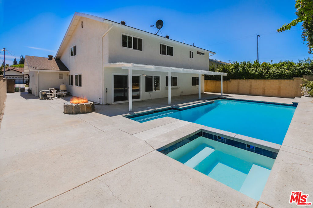 Welcome to this COMPLETELY REMODELED 4 BEDROOM/ 2.5BATH ****POOL**** home w/ 3 CAR GARAGE nestled in the serene neighborhood of West Hills. This residence boasts both luxury and comfort, offering a perfect blend of modern upgrades and includes a LIVING ROOM & ***DEN***. Nestled at the end of a cul-de-sac, this home exudes curb appeal with its meticulously landscaped front yard and a three-car garage that effortlessly accommodates your vehicles while also providing ample storage space. As you step inside, the warm embrace of rich wood floors underfoot sets the tone for the entire living experience. Natural light pours in through large windows. The completely remodeled kitchen, is a chef's dream with its stunning quartz countertops that offer both beauty and durability. New stainless steel appliances and sleek cabinetry provide a harmonious blend of functionality and aesthetics. The living areas seamlessly flow from room to room, connecting the elegant dining area and the cozy family room, creating an ideal space for both intimate gatherings and grand entertainment. The living room features a fireplace, adding a touch of coziness and warmth on cool evenings. The home offers 4 bedroom, and 2.5 completely remodeled bathrooms, featuring Carrera marble floors, and countertops. The primary bedroom is a true retreat, complete with fireplace, walk-in closet, and spa-like en-suite bathroom. Enter the backyard where you will find a freshly re-plastered pool and spa perfect for these hot summer days. Mature trees and hedges provide amble privacy, and a fire pit for intimate gatherings. The West Hills location adds to the appeal of this remarkable home. Known for its quiet charm and proximity to nature, the neighborhood provides a tranquil escape from the bustle of city life while still offering convenient access to shopping, dining, and major transportation routes. In summary, this remodeled pool home in West Hills redefines luxury living. From the wood floors to the quartz countertops, the spacious layout to the sparkling pool, every detail has been carefully considered to offer the ultimate in comfort, style, and functionality. Experience the epitome of Southern California living in this stunning residence.