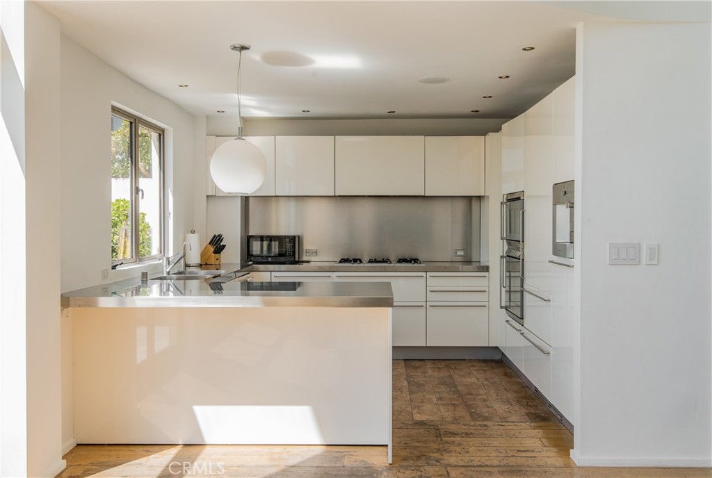 Photo of 11 Marine Terrace #3, Santa Monica, CA 90401 (MLS # SR26218593)