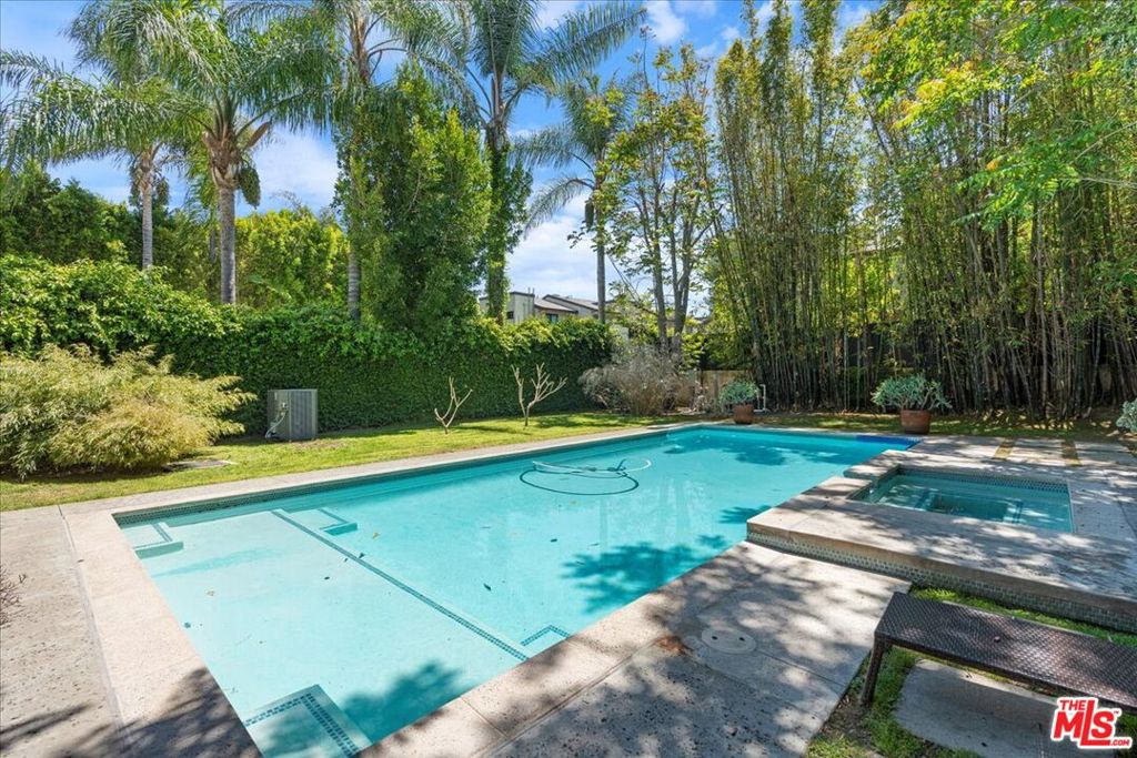 Unmatched Privacy in Prime Studio City!Tucked away north of the boulevard on one of Studio City's most coveted cul-de-sac streets, this rare and ultra-private estate offers an extraordinary opportunity to own a secluded, gated compound in one of the area's most desirable neighborhoods.This exceptional two-story residence has been meticulously updated to blend timeless sophistication with modern comfort. Surrounded by towering gates and fencing, the property offers unparalleled privacy and securityperfect for those seeking a true retreat. With incredible potential for expansion, the home features 5 bedrooms, 3 bathrooms, a formal living room, a formal dining room, a cozy family room, and a spacious signature garage with custom flooring and cabinetry.As you arrive, a long cobblestone driveway and elegant tiled roof set the tone for the luxury within. Inside, you're welcomed by abundant natural light and gorgeous engineered bamboo hardwood floors that flow throughout the home. The expansive living room, with recessed lighting, creates a warm and inviting atmosphere ideal for relaxing or entertaining.Enjoy the peace of mind that comes with a brand-new Lennox HVAC system, custom window treatments, hardwired security cameras, Crimsafe security windows and doors, and fresh interior paintoffering both style and safety.The remodeled kitchen is a chef's dream, boasting sleek countertops, high-end stainless steel appliances including a 6-burner stove, dishwasher, and microwave, stunning cabinetry, and a built-in custom banquette perfect for casual or formal dining.The luxurious primary suite overlooks the Olympic-size Saltwater pool and features an elegant en-suite bathroom with dual vanities, a classic clawfoot tub, a steam waterfall shower, and 2 beautifully designed cherry wood walk-in closets.Step outside to a sprawling entertainer's backyard, complete with turf lawn, a sparkling fenced pool, and 80-foot-tall bamboo trees that provide added privacy and tranquility. The expansive front yard includes a driveway that accommodates up to four vehicles. This rare Studio City gem combines luxury, security, comfort, and unbeatable location. Don't miss your chance to own this extraordinary private estate.