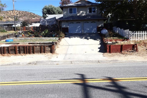 Photo of 14955 Elizabeth Lake Rd, Lake Hughes, CA 93532 (MLS # CV26103467)