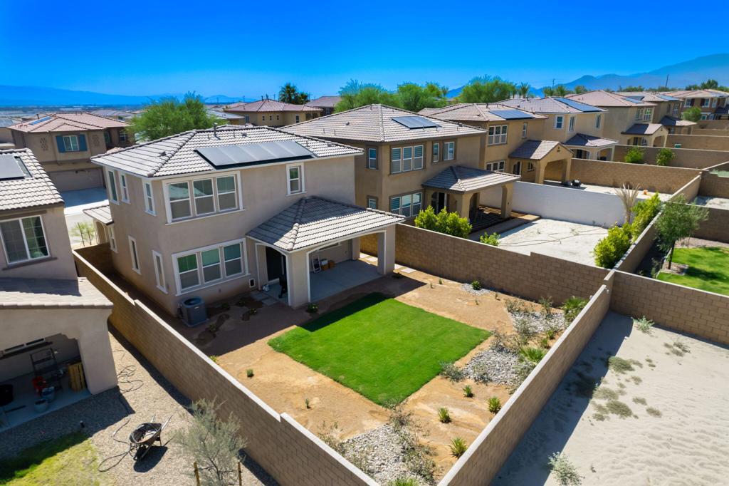 Call Listing Agent James Guillermo 7604491345 Located in the desirable gated community of Dolce, this like-new home offers 3 bedrooms, 2.5 bathrooms, and an open-concept floor plan designed for modern living. The home features upgraded flooring, custom cabinetry, recessed lighting, and a kitchen bar area with upgraded countertops--perfect for entertaining. The primary suite includes a dual vanity, large walk-in closet, and plenty of natural light. Additional upgrades include solar power (tenant pays approximately $100/month), an EV charger, tankless water heater, and low-maintenance desert landscaping in the front yard. The backyard is beautifully finished and showcases stunning mountain views.Enjoy access to the community pool and other amenities that make Dolce a sought-after neighborhood.📅 Available January 1, 2026 Property is tenant occupied and requires 48 hr notice Available January 1'st 2026