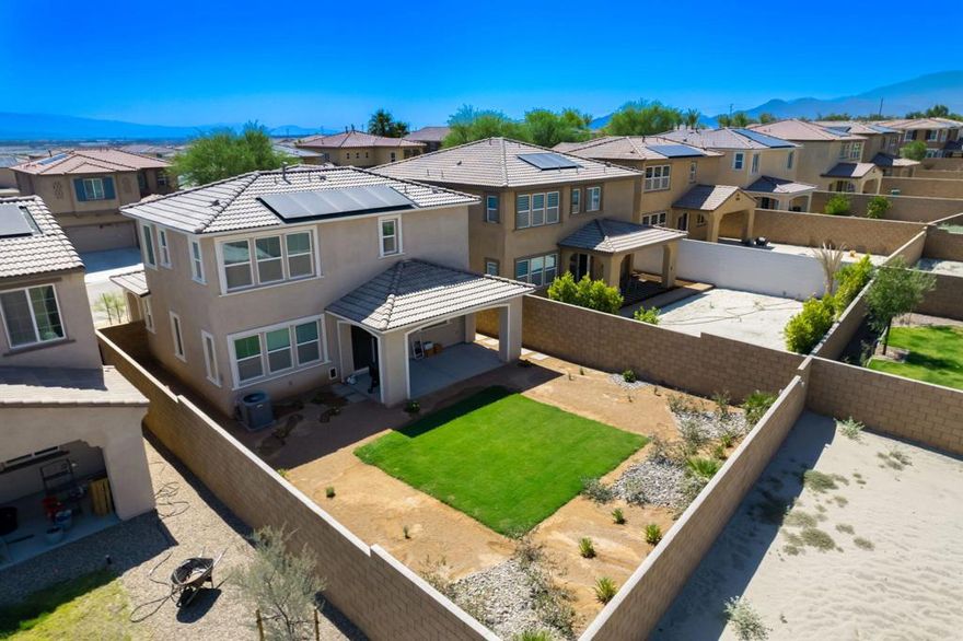 Call Listing Agent James Guillermo 7604491345   Located in the desirable gated community of Dolce, this like-new home offers 3 bedrooms, 2.5 bathrooms, and an open-concept floor plan designed for modern living. The home features upgraded flooring, custom cabinetry, recessed lighting, and a kitchen bar area with upgraded countertops--perfect for entertaining. The primary suite includes a dual vanity, large walk-in closet, and plenty of natural light. Additional upgrades include solar power (tenant pays approximately $100/month), an EV charger, tankless water heater, and low-maintenance desert landscaping in the front yard. The backyard is beautifully finished and showcases stunning mountain views.Enjoy access to the community pool and other amenities that make Dolce a sought-after neighborhood.&#128197; Available January 1, 2026 Property is tenant occupied and requires 48 hr notice Available January 1'st 2026