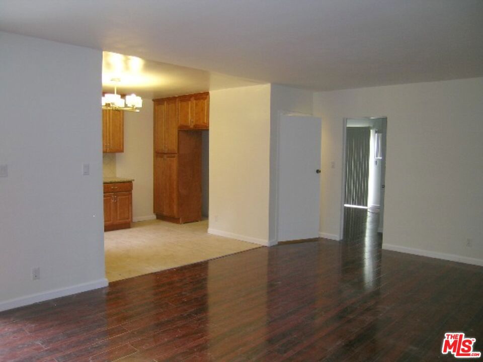 4 bedroom, 2 bathroom downstairs apartment on pretty tree-lined street in great location near downtown Culver City. Close to studios, One Culver complex, Metro Expo line, and all the new developments in the area. Updated lower unit in duplex. Living room, dining area and kitchen are "great room" style. Hardwood floors throughout. Includes stove and refrigerator. Large backyard shared by both tenants. Water and gardener included. Shared laundry room on property. No pets.