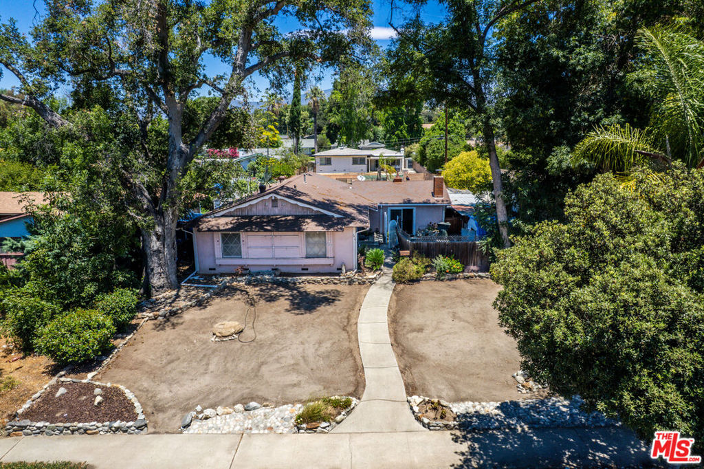 Calling all developers for the perfect fixer and investment opportunity in central Claremont. This amazing 1925 sq. foot 3 bedroom1.5 bath home on a great street is ready for your TLC. Situated on a 9037 sq. foot lot with huge upside potential, this gem in the rough could be a perfect redo and big ROI project. With a beautiful set back approach bordered by gorgeous greenery and cascading trees this could be an amazing VAR. Semi open floorplan with functional kitchen featuring stainless steel appliances and granite style semi island is amazing. Generous step down living room is perfect for gatherings. Bedrooms are nice in size and bathrooms will shine with a bit of upgrades etc. A resort like old school backyard complete with oval palm springs vintage style pool and decking, this place has it all. With storage shed and 4 car off street parking, space is not a problem. Located in one of the best spots of Claremont with access to freeways and colleges right nearby, this is an inland empire developers pallet to create the perfect home. Don't miss this amazing opportunity to make someone's dream come true.