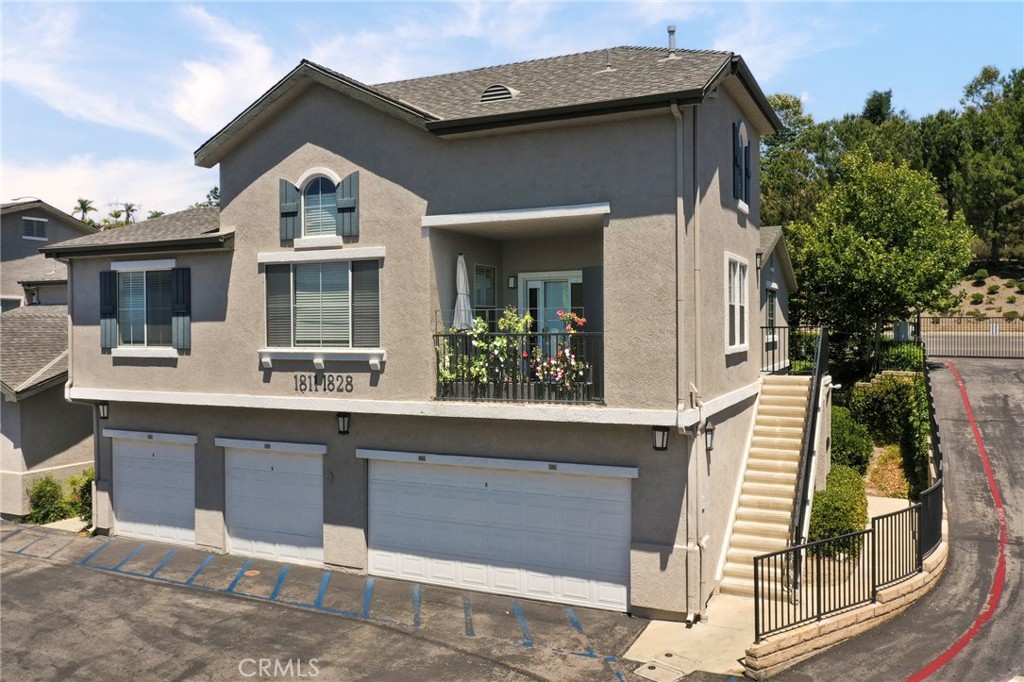 Two bedrooms with an Office/Bonus room! Welcome home to this beautifully updated and reimagined upper-level condo in the highly sought-after gated Bordeaux community of Santa Clarita. This stylish unit offers two bedrooms plus a dedicated office—perfect for today’s flexible lifestyle. As you enter you will discover high vaulted ceilings, brand new laminate flooring, fresh recessed lighting, ceiling fans, and a bright, open-concept layout filled with natural light. The updated kitchen features modern appliances, and plenty of cabinet space. The spacious primary suite boasts a large walk-in closet and a fully renovated bathroom with contemporary finishes. Enjoy the convenience of the in unit laundry with a new washer and dryer included. A private balcony provides a peaceful retreat with mountain and sunset views, ideal for relaxing or entertaining. Additional highlights include central A/C and heat, updated HVAC system, and a one-car garage directly below the unit for privacy and convenience. The Bordeaux community offers resort-style amenities including a sparkling pool, spa, fitness center, clubhouse, BBQ area, and ample guest parking. HOA dues cover water, trash, and common area maintenance—and best of all, there’s NO Mello Roos. Ideally located near award-winning schools, shopping, dining, parks, and major commuter routes, this turn-key home delivers modern upgrades, a smart layout, and low-maintenance living in one of Santa Clarita’s most desirable neighborhoods. Don’t miss this rare opportunity!
