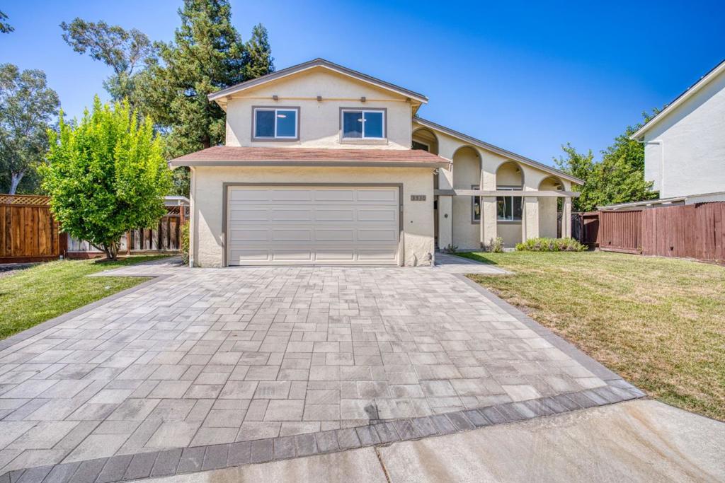 This beautifully updated 3-bedroom, 2.5-bath home sits alongside a scenic park with a walking path, two playgrounds, and a basketball court. Tucked away in a peaceful neighborhood, it offers a serene and welcoming setting for comfortable family living. Inside, youll find a spacious living area with soaring ceilings, an updated kitchen and bathrooms, and elegant engineered wood flooring throughout. Step outside to a private backyard featuring a versatile office shed with air conditioningideal for remote work, fitness, or creative pursuits.Additional highlights include low-maintenance front and back yards, a reinforced foundation, French drain, water softener, and water purifier. Located within a mile of top-rated Pleasanton schools, this home combines convenience with quality living. Dont miss the chance to make this charming home yours!