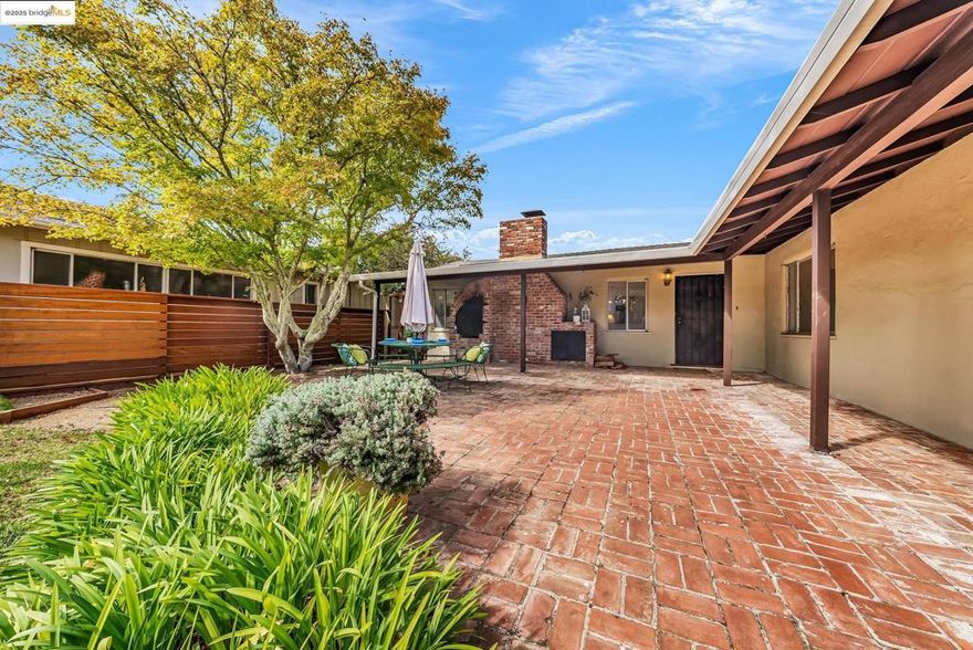 Discover the charm of 7116 Hemlock Street, nestled in Oakland's sought-after Montclair neighborhood. This 3-bedroom, 2-bathroom home spans 2,048 sq ft, offering spacious level-in living. Enjoy breathtaking Bay views from a large private deck off the dining area. The outdoor space features a beautiful recently built fence and a patio with a fireplace, creating the perfect atmosphere for entertaining. The lower level includes a bedroom, expansive family room, utility room, and bathroom. Located near Montclair Village, the property is surrounded by over 200 local shops, restaurants, and essential services. Despite its serene setting, Montclair offers excellent connectivity with Highway 13 and nearby public transit options, ensuring easy access to San Francisco and downtown Oakland. Experience the ideal blend of suburban tranquility and urban convenience. Don't miss this rare opportunity; contact us today to schedule a viewing of this exceptional residence.