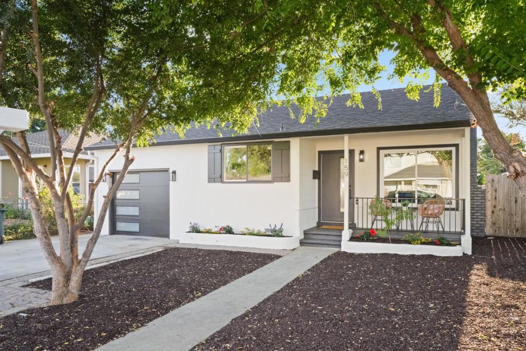 Beautifully updated and turnkey, this 3BD/2BA single-level home offers modern finishes and open-concept living. Step into the spacious living room featuring new laminate flooring and a designer fireplace. The remodeled kitchen showcases quartz countertops, white shaker cabinetry, and brand-new stainless steel appliances, creating a warm and inviting space. The serene primary suite includes an en-suite bath and large closet with seamless indoor/outdoor flow to the backyard. Two additional bedrooms share a remodeled bath with soaking tub. The fully fenced backyard is ideal for gardening, play, or entertaining. Additional highlights include dual-pane windows, recessed lighting, a finished, attached garage with ADU potential, plus a newer roof, updated plumbing, and electrical upgrades. Conveniently located near major commuter routes, tech campuses, shopping, and local parks, this move-in ready home offers the best of Peninsula living.