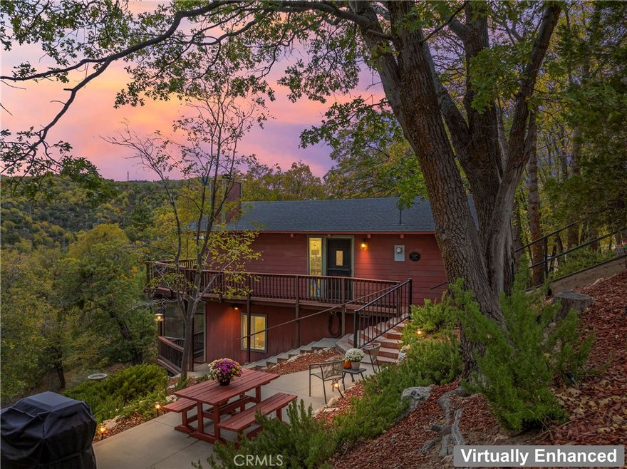 Perfectly Perched Upon The Mountainside Sits A Chic Retreat with A Million Dollar View Just Waiting - For You! Situated on Nearly Half an Acre and Immersed in Nature - This Place will Fill Your Heart with Joy and Give Your Soul the Peace and Tranquility it Yearns For. The Bright and Beautiful Great Room with Vaulted Beamed Ceilings and Fireplace Opens to the Dining Area and the Lovely and Light Kitchen with Updated Appliances. Main Level Suite with Large Closet and Full Bathroom for Easy Living. Downstairs is another Bedroom Suite with A Fantastic Screened In Porch. There are Wonderful Outdoor Spaces to Enjoy the Remarkable Views including a Precious Patio and Awesome Living Room Deck - The Yard is Large Superb for Gardening. The Home Maintains Some Retro Touches while Enjoying Thoughtful Updates - Including Low/No Maintenance Siding and Decking, Upgraded Electrical Panel, Newer Appliances in the Kitchen and Whole House A/C. The Atmosphere here is Simply Unmatched with Sensational Sun Rises and Stunning Sunsets. Let the Adventure Begin! The Whimsey Starts with an Easy Meandering Dirt Road that brings you to this Enchanting Residence. You Arrive to Forever Views of Mountains, Ridgelines, Forests, Trees and Endless Sky where the Eagles Soar and Stars Absolutely Sparkle like you've Never Seen Before! Wildlife Abounds with Local Deer, Bobcats, Bears - This Is Also a Birdwatchers Paradise! It is Easy to Get Here but You'll Never Want to Leave! Just Moments from Local Attractions, Shopping and Dining with the Feel of Ultimate Seclusion. Come Experience this Million Dollar View - Available Now for Half the Price! Pride of Ownership Shines Through - First Time on the Market in over 20 Years, This Well Loved Sanctuary is Ready for It's Next Chapter. Enjoy a Sneak Preview... https://www.youtube.com/watch?v=fiIHdZpf_F8&t=1s