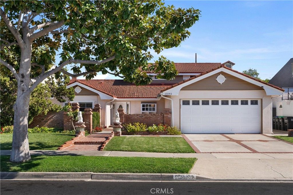 Photo of 13192 Silver Birch Dr, Tustin, CA 92780 (MLS # PW26052767)