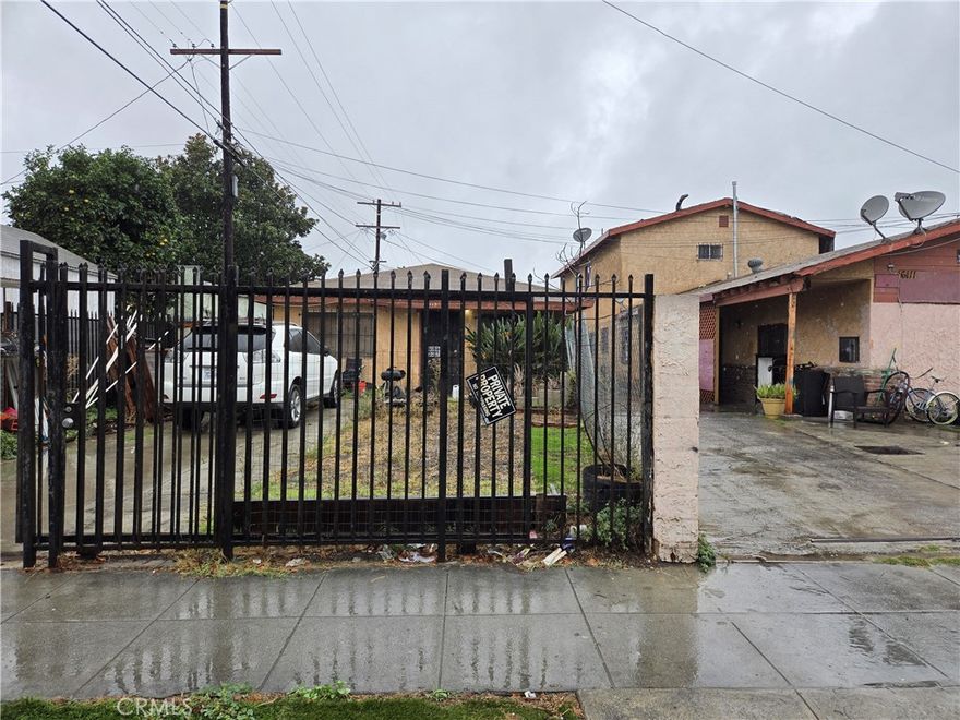 Two Lots, Endless Possibilities!

Priced to sell, this is a rare opportunity to own two adjoining properties that will be sold together in the heart of Los Angeles.  6113 Menlo Ave features a 3-bedroom, 1 bath fixer home with 1,000 sq. ft. of living space on a 4,558 sq. ft. lot.  6111 Menlo Ave is a spacious triplex with (2) 4-bedroom, 1bath units and (1) 2-bedroom, 1bath unit, plus an unpermitted 1-bedroom, 1 bath garage conversion. The triplex is in need of significant maintenance and restoration. Sold together, these properties create a combined lot size of 9,152 sq. ft., offering endless potential for investors and developers.  Options abound - maintain as income-producing rentals, keep the lots separated with fencing, or explore development of a larger multifamily apartment project.  Ample onsite parking adds convenience for residents and guests.  Bring your vision - this property offers tremendous upside and value potential in a  prime  location near shopping schools and major freeways. Don't miss out on this rare investment opportunity!

This is a probate sale with court confirmation.  This property is being sold "as-is," with no warranties, representations or guarantees expressed by the seller. Buyers are encouraged to conduct their own due diligence and inspection prior to purchase to verify and satisfy themselves for permits, land use, potential construction/developments and all conditions.  Please do not go onto the property and Do Not Disturb Tenants.