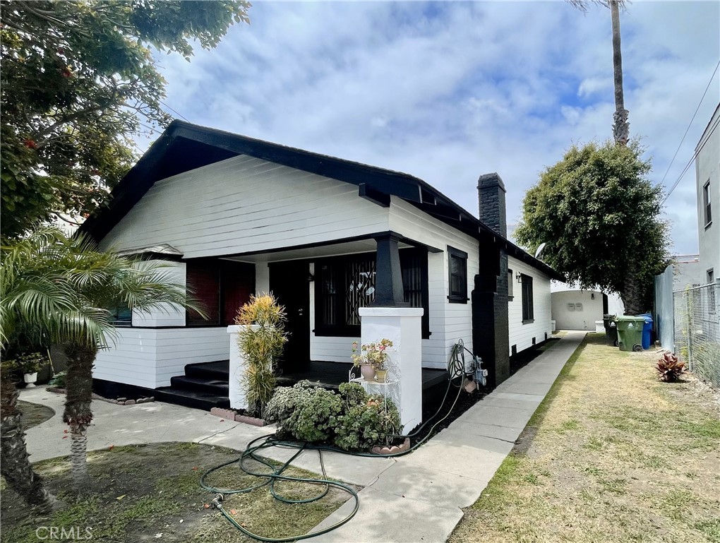 Owner-user opportunity to own this exceptional triplex ideally located in the vibrant community of San Pedro. This property presents an outstanding investment opportunity for a new owner to move into a newly remodeled one-bedroom, one-bath unit while benefiting from tenant contributions to help cover the remaining mortgage.
The front unit boasts two spacious bedrooms, two bathrooms, an indoor laundry area, and a bonus room, offering both functionality and comfort. The two rear units include a studio and a fully renovated one-bedroom, one-bathroom unit, both thoughtfully designed with indoor laundry facilities for enhanced convenience.
This property offers onsite parking, which includes four enclosed garages, offering both security and ample space. Additionally, the potential for an Accessory Dwelling Unit (ADU) conversion enhances its investment appeal—an exceptional and rare asset in this thriving community.