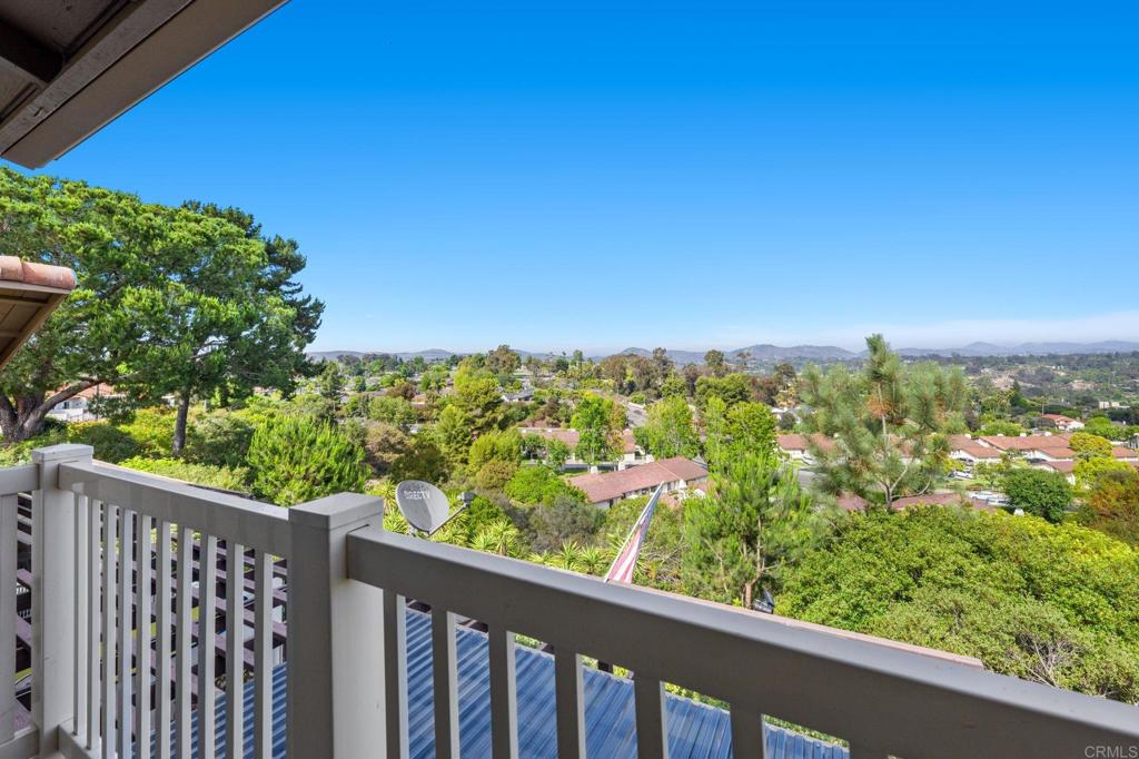 Best location in the development! Step into panoramic gorgeous Encinitas mountain views in this highly desirable quiet location in High Country Villas. Directly across the street from the beautiful 9 hole golf course, pickleball, pool and clubhouse. Upper unit with 2 bedrooms 1 bath home with no neighbors behind you. All new electrical panel just completed. Flooring, bathroom cabinet, lighting and kitchen counter tops all done. Popcorn ceilings removed. This single level town home is in a 55+ community that offers golf, swimming pool and spa, hiking/biking trails, clubhouse activities such as bocce ball, aqua aerobics, exercise classes, clubs and much more lifestyle and friendship. Less than 4 miles to moonlight beach and close to award winning shopping, dining, and medical. Enjoy unbelievable sunsets from the front of the property and follow the colors in the sky over the mountains from your private balcony in the back. Views from every window including golf course views, mountain views and hot air balloon views. Morning sunrises over the mountains are spectacular! Priced to sell so come see asap!