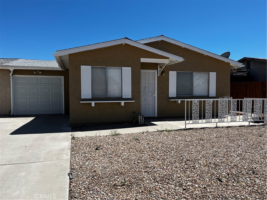 Enjoy peaceful living in this well-kept 2-bedroom, 1-bath home located in a quiet, friendly 55+ community in the HOA of Valle Hermosa. Both bedrooms offer comfortable space and natural light, with the primary bedroom featuring a large closet. The full bathroom is clean and accessible. Additional highlights include an attached garage, enclosed back patio, laundry room, central heating and air.