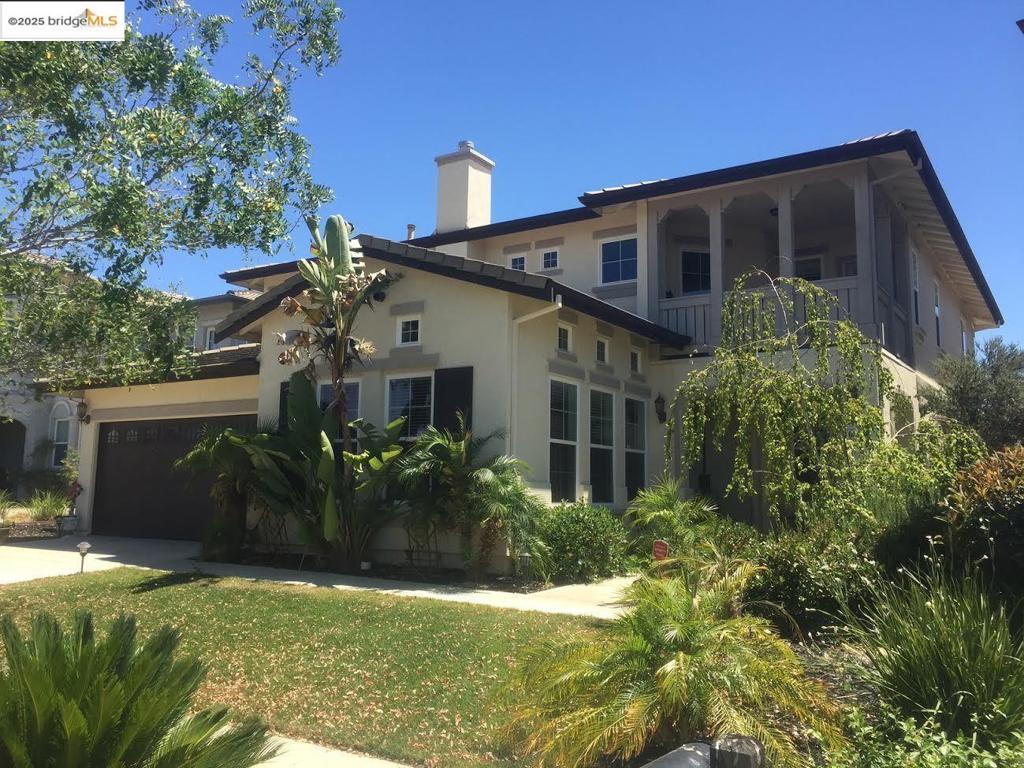 Beautiful home in highly desirable Brentwood Location! This home features 5 Bedrooms, 3.5 Bathrooms, & a loft! Loft contains built-in office cabinetry and overlooks the Foyer! Vaulted ceilings and show-stopping entry with opulent custom crystal lighting! Spacious Master Suite with double door entry and balcony! Large Master Bathroom with walk-in closet, Jacuzzi soaking tub, large vanity and walk-in glass shower! Second floor Laundry Room with Premium Samsung Washer and Dryer! Guest bedroom on second floor has private balcony! Two additional guest suites with a guest bathroom as well. Formal dining room with custom crystal lighting! Formal living room bathed in light with gas fireplace. A Must-See!!!