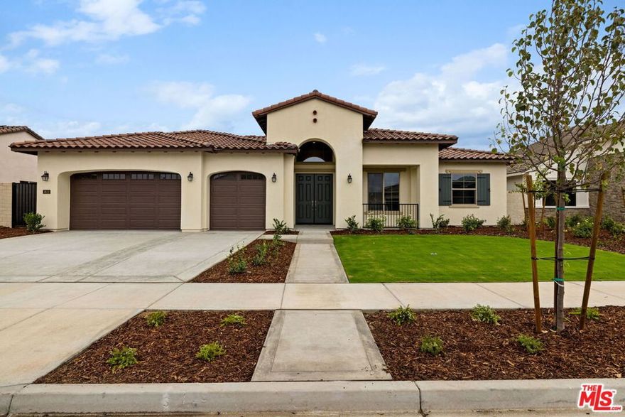 Stunning 2,737 sq. ft. Spanish elevation home on an 11,982 sq. ft. non-gated cul-de-sac lot. Features 4 bedrooms, 3.5 baths, indoor & outdoor fireplaces, and a French door from the primary suite to the outdoor living. The chef's kitchen showcases KitchenAid appliances that include a 6-burner cooktop, microwave, dishwasher, a pot filler, upgraded quartz countertops, designer backsplash, and beautiful maple cabinets in coffee stain with clear glass doors at some of the cabinets & stylish pulls. Luxury vinyl plank flooring flows throughout with upgraded tile in baths and upgraded carpet in secondary bedrooms. Move-in ready with elegant finishes and spacious design in beautiful Belcourt Seven Oaks