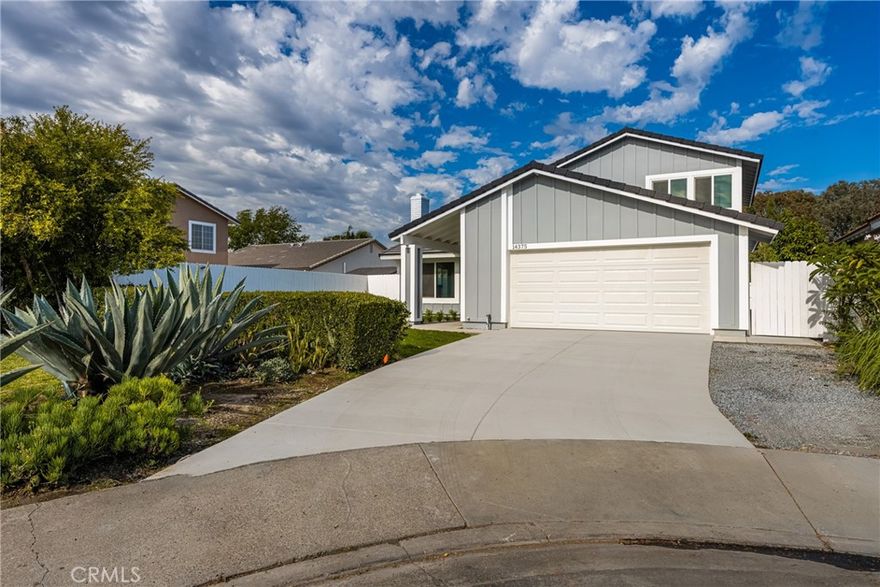 Welcome to The Colony! Nestled in a beautiful, well-established, and family-oriented neighborhood, this stunning four-bedroom, three-bath home has been completely remodeled. The bright, modern kitchen features stainless appliance, crisp white cabinetry, oversized island, breakfast bar and dinning area, beautiful countertops, and natural-toned flooring throughout. Enjoy a cozy family room with high ceilings and modern fireplace. There is a convenient downstairs primary bedroom, along with two guest bedrooms and a hallway bath. Upstairs, you’ll find an enormous primary suite offering elegant bathroom with privacy and comfort. Landscape front and back with fruit trees and new sod. Additional upgrades include high ceilings, laminate flooring, ceiling fans, new air conditioning, heating system, water heater, new windows, new roof, and fresh paint. Enjoy the association amenities with private clubhouse, 3 Olympic-size pools, spacious parks, BBQ Area, Clubhouse, tennis courts and basketball courts, and tree lined jogging paths.  Located on a quiet cul-de-sac, this home is centrally positioned near shopping centers, freeways, and award-winning schools. This is one property you won’t want to miss!