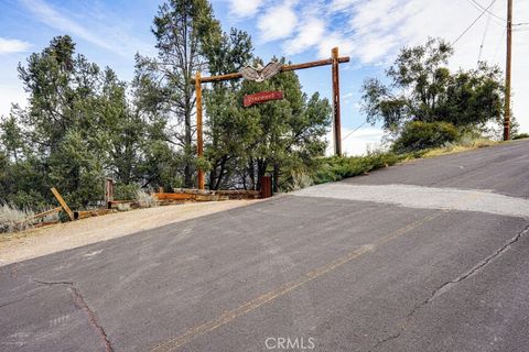 Photo of 2216 St Bernard Dr, Pine Mountain Club, CA 93222 (MLS # SR26148428)