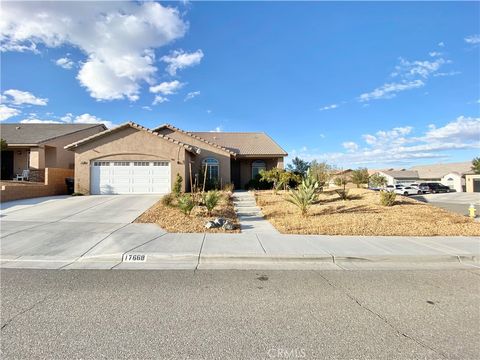 Photo of 17668 Park Terrace Court, Victorville, CA 92395 (MLS # IV25233867)