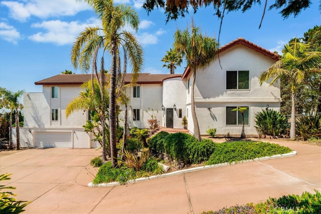 Unobstructed, breathtaking views of the valley, hills, and on a clear day, the ocean! Enjoy remarkable sunrises and stunning sunsets. This 4052 sq. ft home is value-packed at under $400 a sq. ft! Featuring 5 bedrooms, 3.5 bathrooms, with potential multi-generational living, with 2 large main suites. First main level suite has 3 large closets, a private ensuite bathroom, and a potential for a private entrance. Also on the main level is an amazing living room featuring abundant windows, soaring ceilings & an inviting fireplace. The improved kitchen features abundant cabinets, quartz countertops, soft-close drawers, a rolling island, & walk-in pantry. The kitchen connects to a large, comfortable family room, also with wonderful views. The home would benefit with new flooring so sellers are offering a flooring credit. Seamless indoor-outdoor entertainment with 4 patio/ French doors outside! Upstairs is the 2nd large main suite with its own personal private deck with panoramic views & an ensuite bathroom. Upstairs are 3 more bedrooms and a 3rd bathroom. Oversized 968 sq. ft, 3-car garage gives ample space for cars, storage, & hobbies. To the west are Potential RV/Boat, & extra parking + easy access to the level large side yard. A large section of the backyard is level & awaiting your vision! No HOA, build a shop, own horses & more! Nipomo, dubbed, one of the best places to live! Enjoy award-winning golf, beaches, wineries, & close access to HWY 101 & San Luis Obispo Airport!