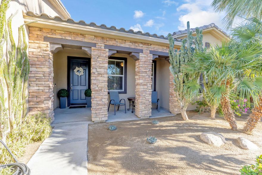 This beautifully upgraded home features RV parking with sewer hook-up, soaring 9-foot ceilings, and elegant 18' natural travertine tile flooring, creating a timeless and luxurious feel throughout. Guest bedrooms offer newer carpet installed in 2023 for added comfort.The exterior of the home was freshly painted last June, enhancing curb appeal and showcasing pride of ownership. The outdoor living space is thoughtfully designed with a custom Alumiwood awning (2023), a large high-end outdoor ceiling fan, recessed lighting, and striking stone pillars. Sleeving has already been installed inside the stone columns for a future misting system (not visible), along with an electric outlet ready for string or holiday lighting.A custom metal side gate and man door (2023) add functionality and security. Bonus extras included for future projects: additional travertine tiles, a full pallet of faux exterior stone blocks, and plans for a swimming pool--offering incredible potential to further enhance this exceptional property