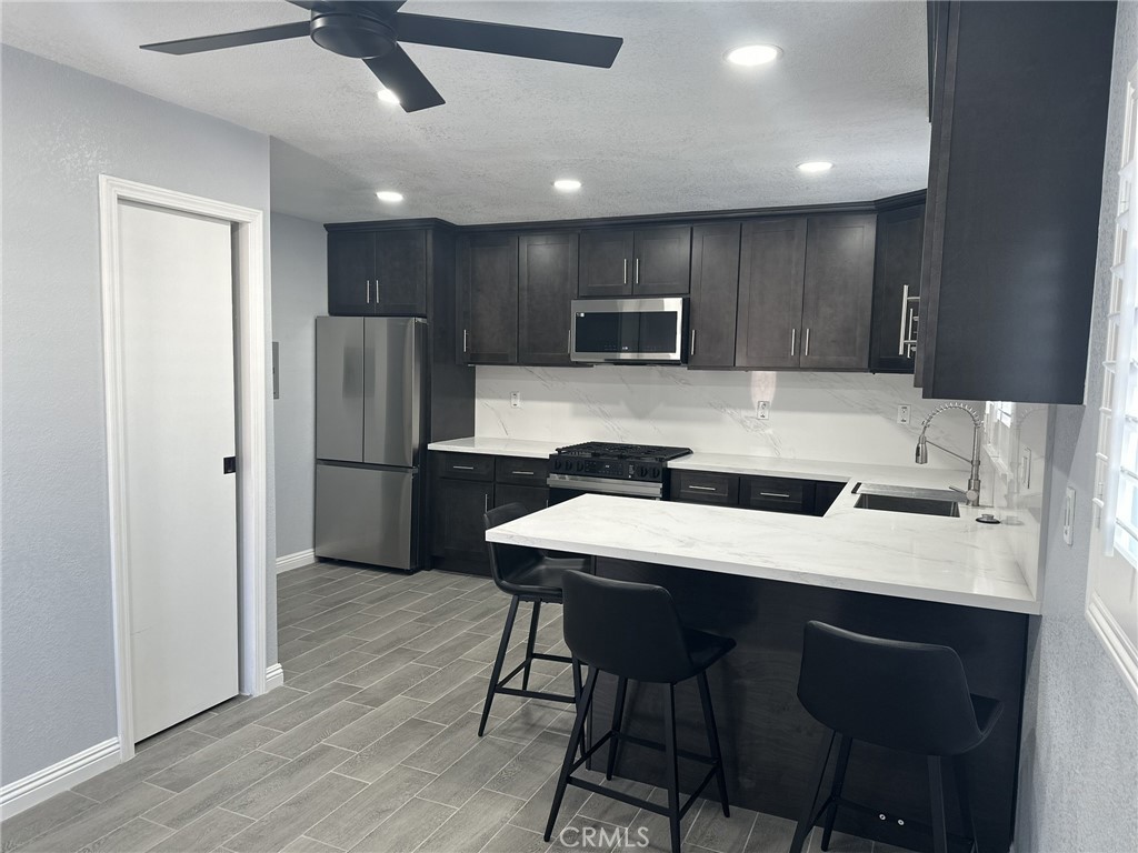 Experience tranquility in this brand new spacious ADU. This residence was designed with prestige aesthetic finishes, including vinyl flooring, recessed lighting, a mini split heating, and cooling system to ensure a year-round comfort efficiently. Walk-in shower with glass enclosures, sleek stainless steel kitchen appliances, beautiful cabinets and the convenience of an in-unit laundry, digital wall tv mounts installed. Nestled in a quiet, full residential neighborhood, you'll benefit from nearby shopping areas, restaurants and excellent freeway access. Private entry, your assigned parking space and it's own private patio area.