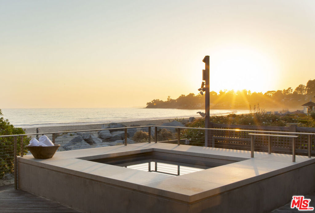 Welcome to the ultimate oceanfront estate! Stunning contemporary architecture & finishes highlight the ever-evolving grace of the Pacific & offer an extraordinarily luxe and laid back home, epitomizing the California Dream. Expertly poised, the home's position captures an overly expansive view of the coast that spans well beyond its apx 77' of beach front. An intelligent design ensures that dramatic ocean views are seen from nearly every room of the residence, all of which open to outdoor spaces. Whether on the expansive seaside deck, the private rooftop patio, or by the fireplace of a central enclosed courtyard, the ocean breeze floats throughout the home with ease. A beautiful guest house & a lit tennis court round out this magical seaside compound. FURNITURE IS AVAILABLE SEPARATELY.