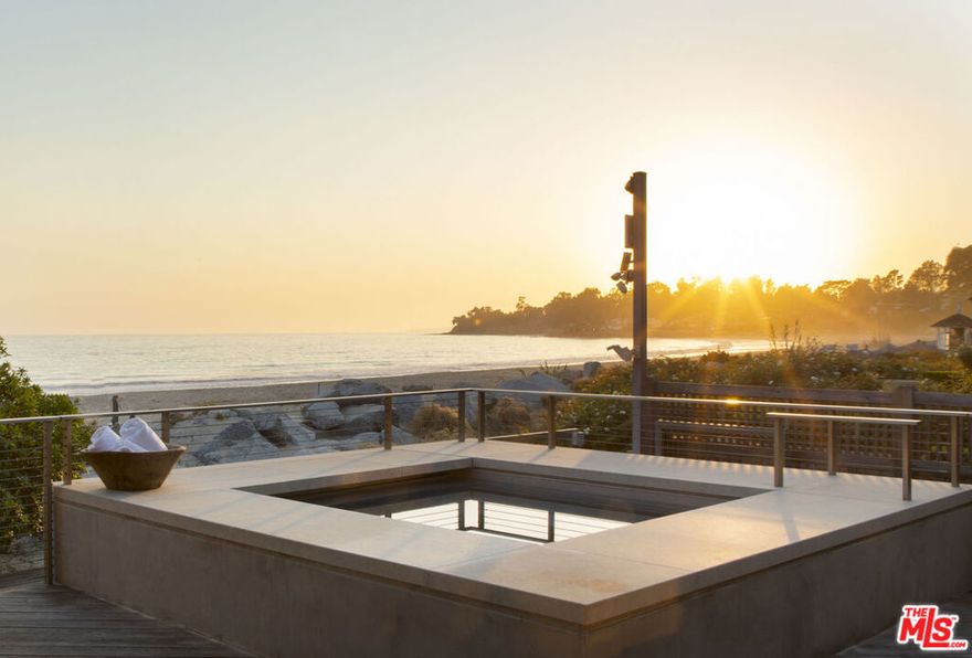 Welcome to the ultimate oceanfront estate! Stunning contemporary architecture & finishes highlight the ever-evolving grace of the Pacific & offer an extraordinarily luxe and laid back home, epitomizing the California Dream. Expertly poised, the home's position captures an overly expansive view of the coast that spans well beyond its apx 77' of beach front. An intelligent design ensures that dramatic ocean views are seen from nearly every room of the residence, all of which open to outdoor spaces. Whether on the expansive seaside deck, the private rooftop patio, or by the fireplace of a central enclosed courtyard, the ocean breeze floats throughout the home with ease. A beautiful guest house & a lit tennis court round out this magical seaside compound. FURNITURE IS AVAILABLE SEPARATELY.