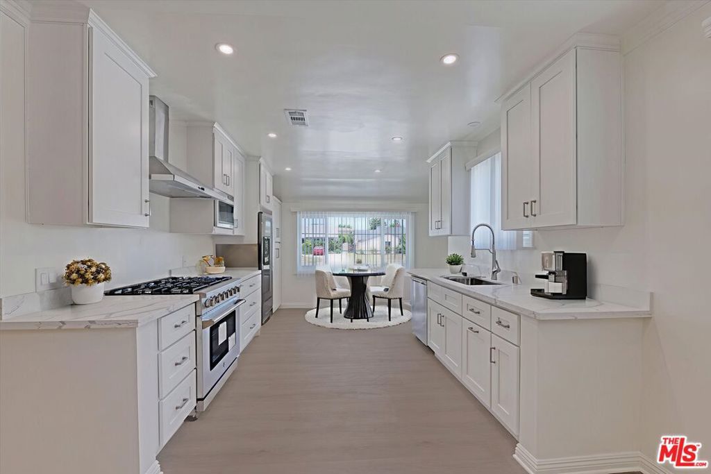 Photo of 7026 Colbath Avenue, Van Nuys, CA 91405 (MLS # 25551391)