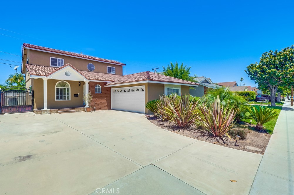 This neighborhood home has been thoughtfully upgraded and is ready for you and your family to move right in! It features a beautifully landscaped front and back yard, with room for kids to play in the driveway and space for outdoor grilling and dining on the tiled back patio that you can access through the sliding doors in the living room. You can even pick fresh lemons from the trees out back! As you enter through the red oak front door, you can feel the warmth of the natural sunlight throughout the open concept living/dining area which has just been freshly painted.
The main-level bedroom could be used as an office and the main level bathroom consists of a cultured marble stand-up shower. The kitchen has been recently updated with white shaker cabinets, quartz countertops, a tiled backsplash and high-end, stainless-steel appliances. Carpeted stairs lead up to the 2nd floor where you will find the two spacious bedrooms, each with large walk-in closets with plenty of storage space. This home resides in the Torrance Unified School district, one of the best in the state, and is less than a mile away from Del Amo Fashion Center. And don't forget that will be able to drive to the beach in less than 10 minutes! Hundreds of dining, shopping, entertainment options and access to parks and hikes will all be right in your neighborhood. Refrigerator, washer and dryer are included. Pets are negotiable with an additional deposit.