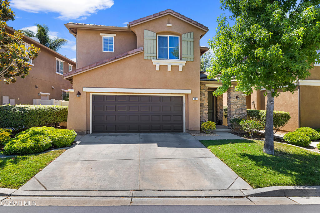 Discover modern living with exceptional upgrades at 601 Clearwater Creek in highly sought-after Brighten Lane Community! This impressive 4-bedroom, 2 1/2 bathroom home, built in 2007, boasts over 2,000 sq ft of thoughtfully designed space. The heart of the home features a comfortable living room with a charming fireplace and built-in shelving, perfect for cozy evenings. The kitchen shines with its updated stainless-steel appliances and elegant granite countertops, opening to a dedicated dining room - ideal for entertaining or family meals. You'll immediately appreciate the brand-new interior paint and all-new carpet upstairs, offering a fresh, contemporary aesthetic from the moment you arrive. Practical features abound, including a convenient upstairs laundry room and an attached garage with smart built-in cabinets and overhead racks for superior organization. Beyond these thoughtful enhancements, you'll love the tranquil setting and proximity to Newbury Park's excellent schools, vibrant community, and endless outdoor adventures (nearby public lands, extensive trail network and the creek in the back) amidst scenic rolling hills that explode with wildflowers every Spring. This home offers the perfect blend of updated comfort, an active lifestyle, and superb everyday functionality. This home is a must see and will not last long! Schedule your showing today!