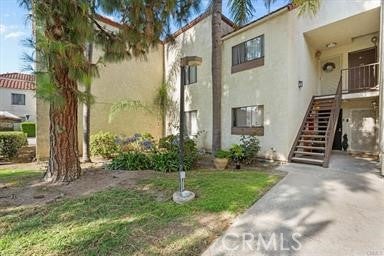 Photo of 711 W 1st St #104 ST, Santa Ana, CA 92701 (MLS # IG26226767)