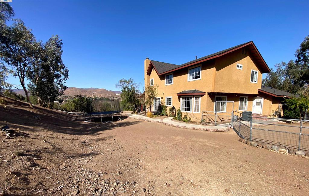 Welcome to 31733 Lake Meadow Rd, Acton – a rare blend of country living and modern comfort on expansive usable acreage. Zoned A-2 for animals, this property is ideal for horses, hobby farming, or anyone seeking space with Los Angeles County convenience. The home offers a bright living room with vaulted ceilings and fireplace, a formal dining area, and a spacious kitchen with island and abundant storage. The primary suite includes dual vanities, soaking tub, and walk-in shower, while additional bedrooms are versatile for family, guests, or office use. Bonus areas include a sunroom, flex space, and custom workstation — perfect for remote work or creative pursuits. A large laundry room and attached garage add functionality. Outdoors, enjoy covered patios, panoramic mountain views, fenced acreage, and a workshop/garage. Designed for equestrian use or private country living, this property delivers the best of Acton’s lifestyle while minutes from the 14 freeway, schools, and shopping. Highlights: A-2 zoning, 4 bedrooms + bonus areas, expansive lot, equestrian potential, workshop/garage.