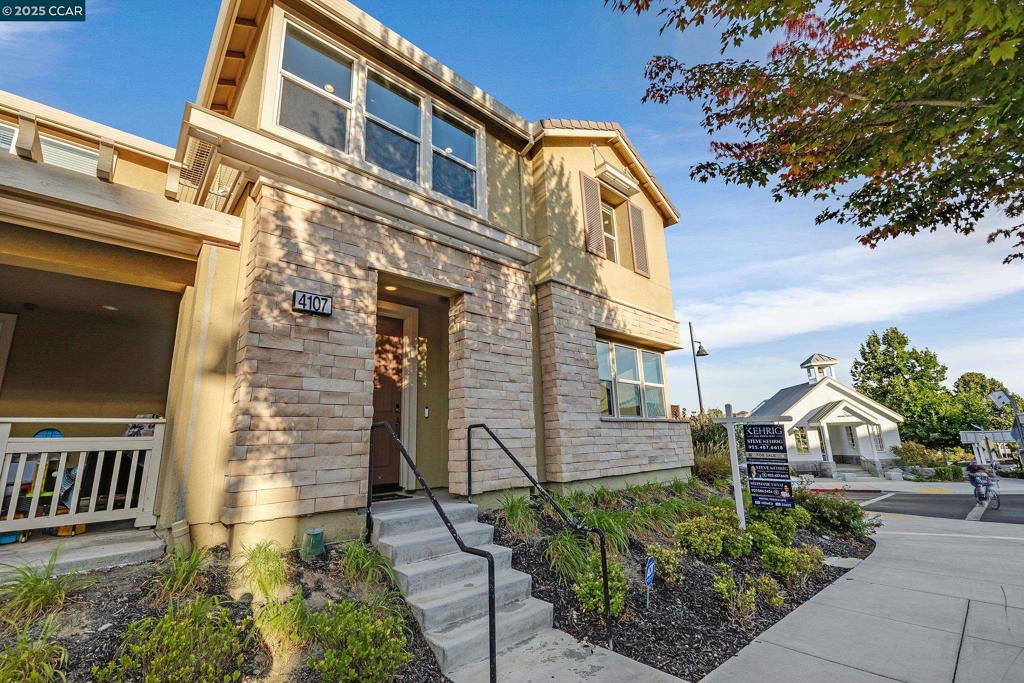 Experience luxury living in the prestigious gated community of Wallis Ranch with this beautifully upgraded two story end unit that offers privacy, natural light, and breathtaking views. Featuring four bedrooms and three and a half bathrooms across 2,052 square feet, the home includes a full bed and bath downstairs with a custom murphy bed, a built-in office desk, custom-made California closets, and a custom pantry under the stairs. The redesigned kitchen boasts custom cabinetry, high-end appliances, and a seamless connection to the outdoors through a stunning Lacantina bi-fold door that opens the entire wall to the private yard. Modern conveniences abound with a fully owned solar system, EV charger, water softener, water filter, smart home technology for thermostats, lights, shades, and garage door, as well as an ADT alarm system ready for activation. Every detail has been carefully considered to maximize comfort, style, and functionality. Residents of Wallis Ranch enjoy resort-style amenities including a clubhouse, pool, spa, gym, parks, walking trails, and a community garden, all while being close to top-rated schools, shopping, dining, and commuter routes. This move-in-ready home is the perfect blend of elegance, innovation, and convenience.