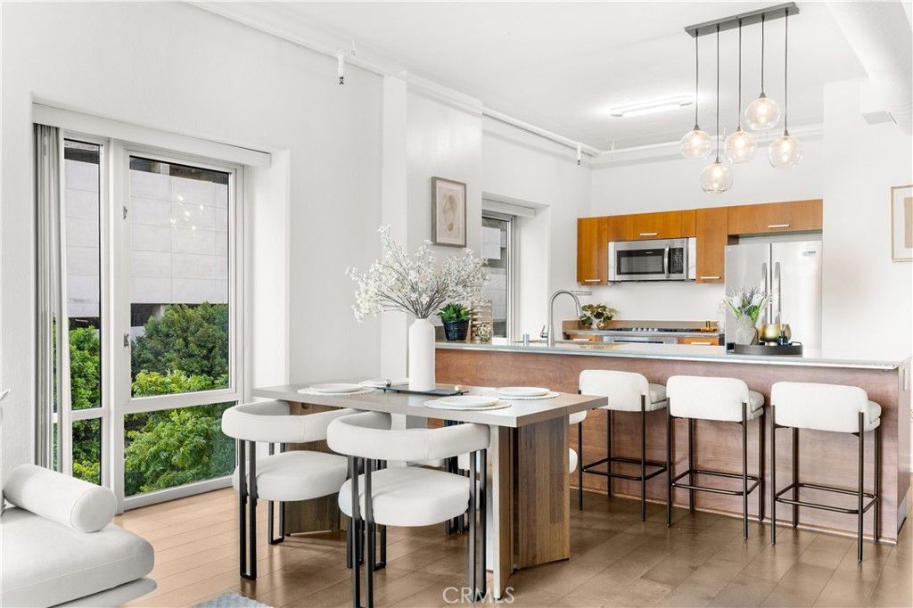 Photo of 645 W 9th St St #303, Los Angeles, CA 90015 (MLS # OC26079183)