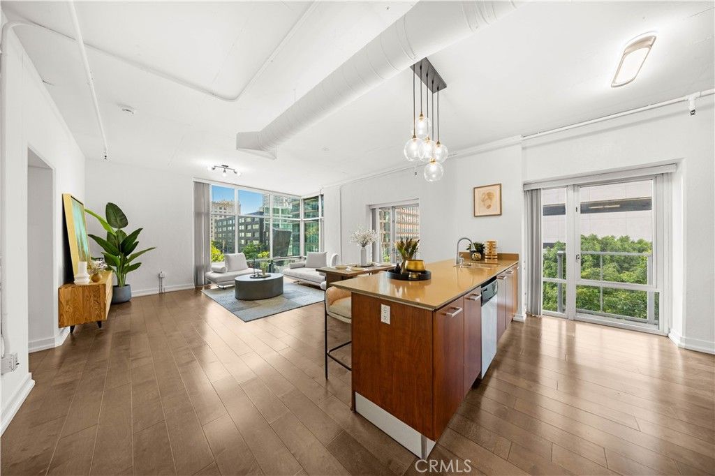 Photo of 645 W 9th St St #303, Los Angeles, CA 90015 (MLS # OC26079183)