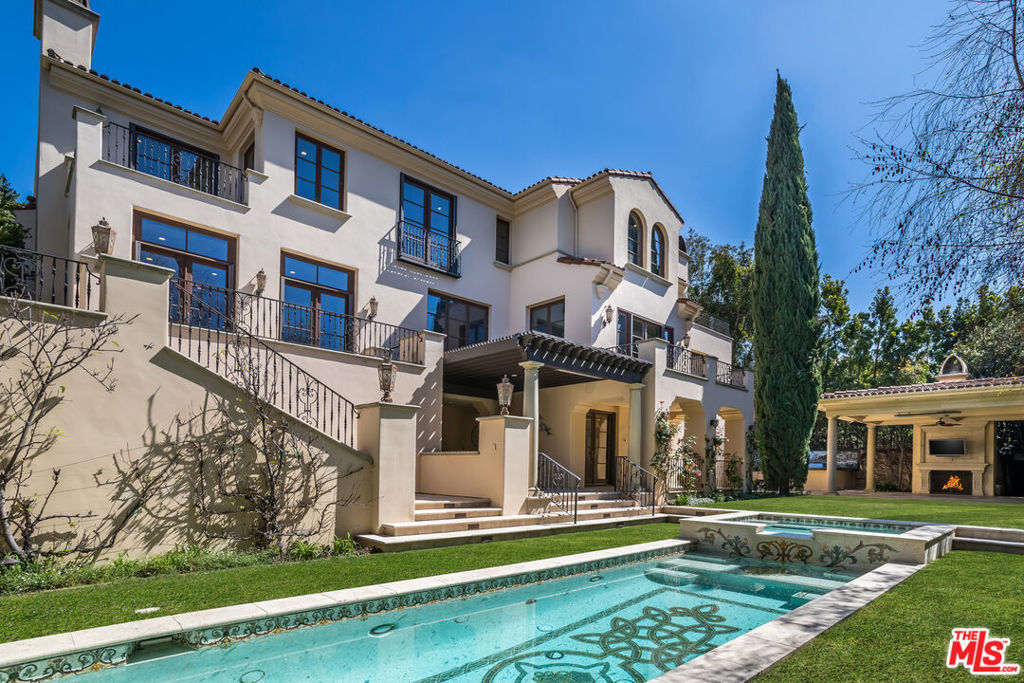 Palatial Italianate Estate in exclusive, guard gated Bel-Air Crest offers luxury, privacy, and security with 7 ensuite Bedrooms plus office and media room . Main level features a grand,2 story entry with sweeping stairway, a gorgeous living room, gracious formal dining room, incredible, dine-in cook's kitchen, family room, spacious study, 2 powder rooms and a guest bedroom with bath. Upper level boasts a sumptuous master suite with mountain views, an enormous walk- in closet , fireplace and sitting area with built ins. There are three additional bedroom suites on the top level, all with their own baths. The. lower level opens to an entertainer's yard and includes a media room, gym (7th bedroom), wine cellar, laundry and a guest bedroom. An elevator and 2 staircases provide easy access to all floors. Private grounds feature exquisite mosaic pool, spa and heated outdoor living room with fireplace and custom outdoor kitchen. 3 Car garage parking plus additional in the paved and gated drive. In addition to your personal amenities, Bel Air Crest offers a community gym, party room, pool , tennis and basketball court. Live like royalty in this impeccable, residence. Amazing opportunity and incredible value. Also for lease.