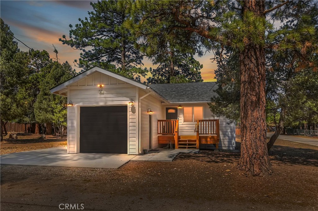 Built in 2022, this beautiful 2-bedroom, 2-bathroom home blends contemporary design with the peaceful charm of Big Bear’s Erwin Lake neighborhood. Step inside this newly built home and you'll immediately appreciate the open-concept living area, showcasing vaulted ceilings, custom flooring, and a Wood burning high efficiency fireplace to keep you cozy and warm on those snowy evenings. The kitchen is a modern delight with stainless steel appliances, quartz countertops, soft-close cabinetry, and island with barstool seating ideal for entertaining. The primary suite offers a blissful escape with its en-suite bath and large closet. A second bedroom and full guest bathroom provide stylish and flexible space for guests or home office. Outdoors, enjoy your spacious yard with room for relaxation, pets or play and plenty of space for future additions like a spa or fire pit. The 1 car detached garage offers extra storage and ease of parking. Located just minutes from hiking trails, Big Bear Lake, and local attractions yet tucked away from the hustle this home is a perfect mix of modern design, comfort and natural beauty.