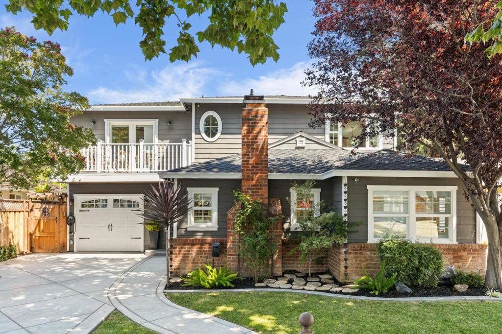 Stunning Willow Glen home nestled on a picturesque tree-lined street in the highly coveted Booksin School District, just moments from vibrant Lincoln Ave with its boutiques, dining, and entertainment. Expanded and completely renovated in 2016. The open-concept design offers a chef's kitchen, featuring a Wolf range, double ovens, quartz countertops, a breakfast nook, and a grand island flows seamlessly into the inviting living room, elegant dining area with wet bar, and a spacious family room that opens to a private backyard retreat. Mature landscaping surrounds the saltwater, solar-heated pool, an ideal setting for entertaining or relaxing. The attached finished garage offers flexibility as a gym or creative workspace. A ground-level bedroom with full bath provides the perfect space for guests or a home office. Upstairs, the primary suite serves as a private sanctuary with a spa-inspired bath, soaking tub, dual sinks, and walk-in closet. Two additional bedrooms share a radiant-heated hall bath, with laundry conveniently located on the same level. Smart-home amenities include dual-zone HVAC with smart thermostats, an EV Level-2 charger, and automated drip irrigation for effortless living. This home perfectly blends modern luxury with timeless neighborhood charm.