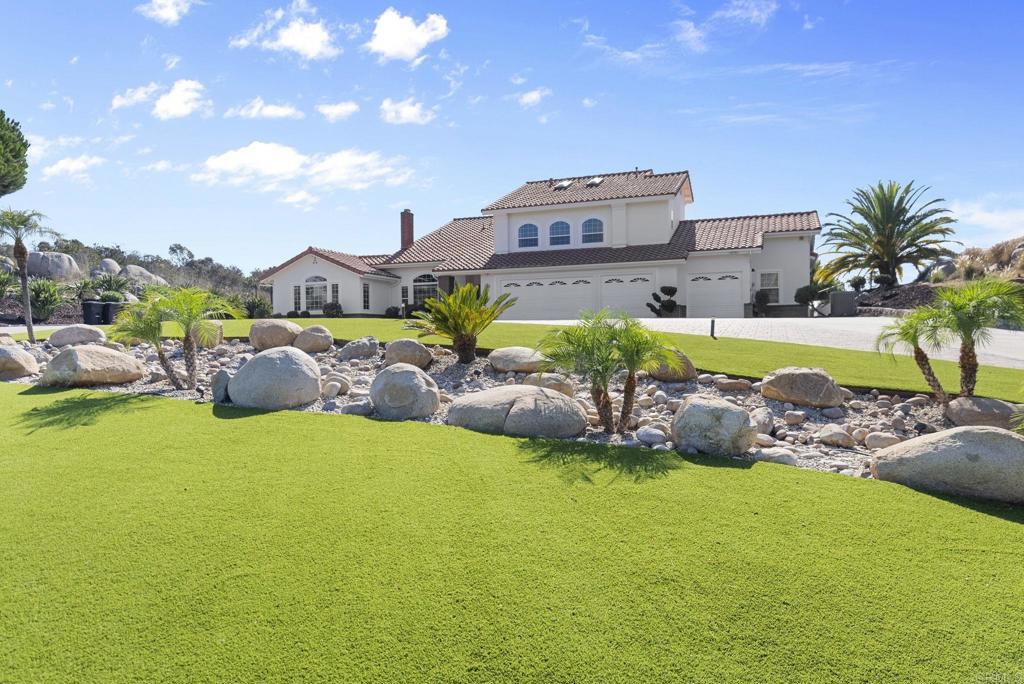 Welcome to 15458 Harrow Lane! A residence where luxury design, thoughtful upgrades, and effortless comfort come together on an impressive 75,000+ sq.ft. homesite. With 4-bedrooms, 4-bathrooms(plus 2 optional bedrooms). Every inch of this property has been enhanced to create a home that’s as functional as it is beautiful. Step into a bright, open interior where custom architectural details and designer-selected finishes set the tone. The main living spaces flow seamlessly, featuring LVP flooring, modern glass railings, and expansive windows that frame serene views. Beautiful kitchen with plenty of storage, complete with premium appliances, custom cabinetry, and abundant counter space for culinary creativity. For entertainment, the fully transformed theater offers an immersive experience with high-end sound, a professional-grade projector, and plush seating. Outdoor living is equally impressive with a private saltwater pool surrounded by lush greenery, and multiple lounging and dining areas make it easy to relax or host guests year-round. The home also boasts a beautifully epoxy finished garage with an integrated gym, upgraded climate systems, OWNED solar for energy efficiency, and meticulously designed closets throughout. Every upgrade has been carefully selected to enhance style, comfort, and daily living. Perfectly located within The Groves gated community, this home offers the privacy you want with easy access to top rated schools, shopping, dining, and outdoor recreation. Move-in ready and designed for those who value quality at every level.