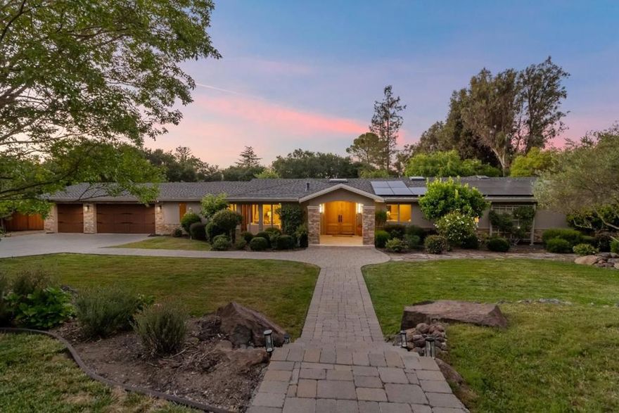 SOPHISTICATED COUNTRY AMBIANCE IN PREMIER CLOSE-IN LOCATION. This property is truly in a league of its own. Magnificent, mainly flat 1+ acre lot nestled in the Los Altos Hills with Zen-like tranquility and seamless integration of pristine landscape and stunning interior design. No expense was spared, no detail overlooked in the interior redesign & expansion to the studs in 2008 with every thinkable amenity selected by professional designer. Open gathering areas with large windows strategically framing beautiful views w/amazing light. The Great Room offers the ultimate open chef's kitchen with professional-style appliances and huge family room w/dining area and fireplace. Elegant formal living and dining rooms, 4 bedrooms (3 ensuite) 4.5 baths, 1 w/steam shower and home office w/custom built-ins. The large stone patio is the ideal venue for family gatherings or grand-scale entertaining w/outdoor kitchen, firepit, mature landscaping, sports court for Pickleball and the ultimate in privacy and serenity. Energy-efficient solar system, numerous skylights, Japanese soaking tub, closet organizers, dual zone heating/cooling, Andersen wood-cased windows/sliding doors. Short drive to LA Village shopping/dining, tech centers, nature preserves, Hwys 280/101/85. Excellent Palo Alto schools