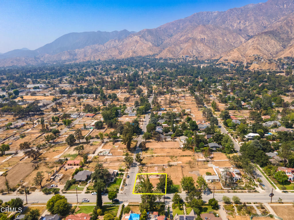 Nestled in the coveted foothills of Altadena, 1215 E Mendocino Street offers an opportunity to reimagine and rebuild in a peaceful, tree-lined neighborhood . Set on a generous lot framed by mountain views, this parcel is just moments from scenic hiking trails and the charm of North Lake Avenue's shops and cafes.This home was destroyed in the Eaton Fire, and the property is being sold as land only. This flat, rectangular parcel, 7,847 SF (per LA County Assessor), All utilities were available before the fire. Prior home had a sewer connection, and water, electric, and gas stubbed to the site. Public records indicate the lost home was 2,522 square feet with 3 beds, 2 bath plus a garage. Buyer to do their own due diligence and investigations as to the use of the land and any future building requirements. Buyer shall purchase the property in AS-IS condition using VLPA form. Seller has no architectural plans, permits, entitlements, surveys, or other pre-construction documentation.