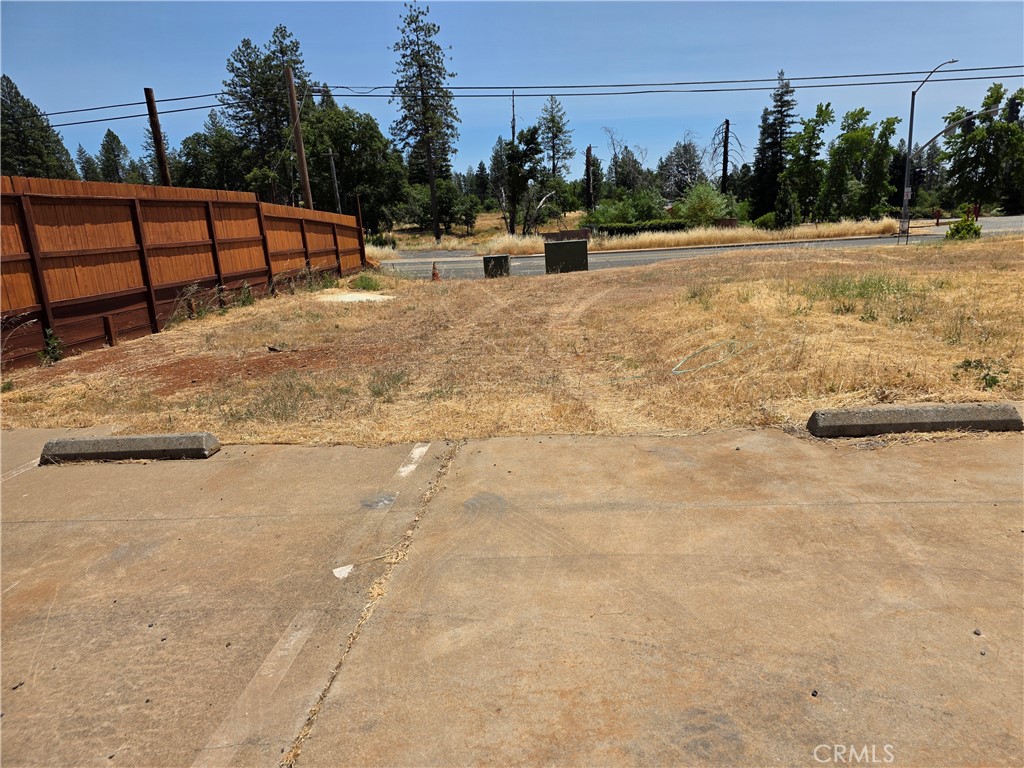 This Commercial parcel has super visibility right on the corner of Central Park and Clark Rd. A real estate office with 2144 sq ft was on the property prior to the Camp Fire. The driveway into the property is off Central Park Dr. Paradise is growing and there is a real need for commercial businesses in our town. Seller states they have been paying the Ready to serve to PID. Septic inspection is ordered.