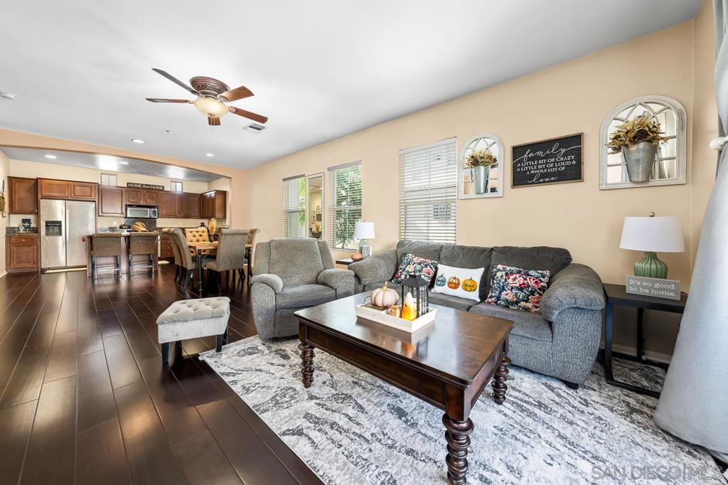 This 3 Story home features 3 Bed. and 3.5 baths (1Bed & Bath on 1st floor) located in the Master Planned Community of Windingwalk. Perfect for First Time Homebuyers! Includes an open floor plan, Stainless steel appliances, granite counter-tops, upgraded Flooring at Kitchen and Living/Dining area. Great amenities, Pool & playground just steps away. This Prime Location is walking distance to Otay Ranch Mall, Shopping centers, restaurants, theater, fitness center, and In and out Burger! Great schools and more! VA Approved! Priced to Sell**Seller will give credit towards Rate Buydown with right offer** Equipment: Fire Sprinklers,Garage Door Opener Sewer: Sewer Connected Topography: LL